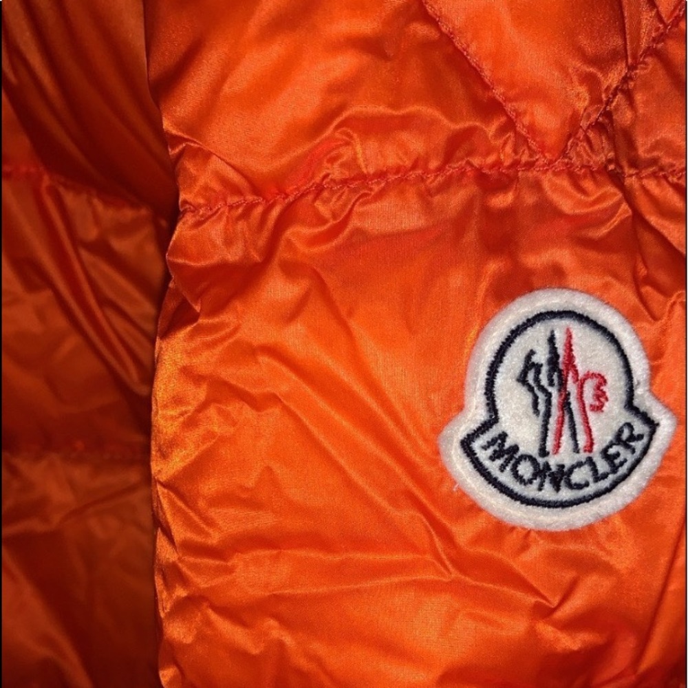 Moncler orange puffer jacket